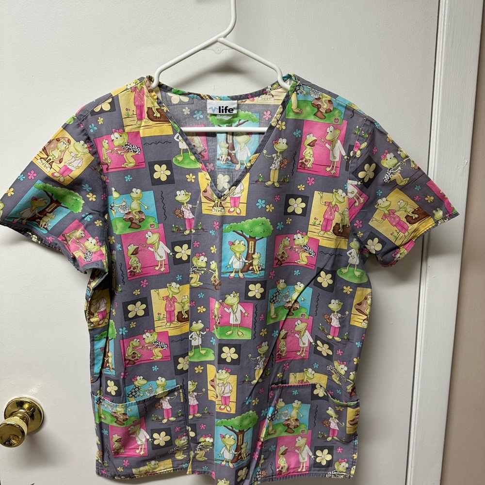 Women’s scrub top, excellent condition.